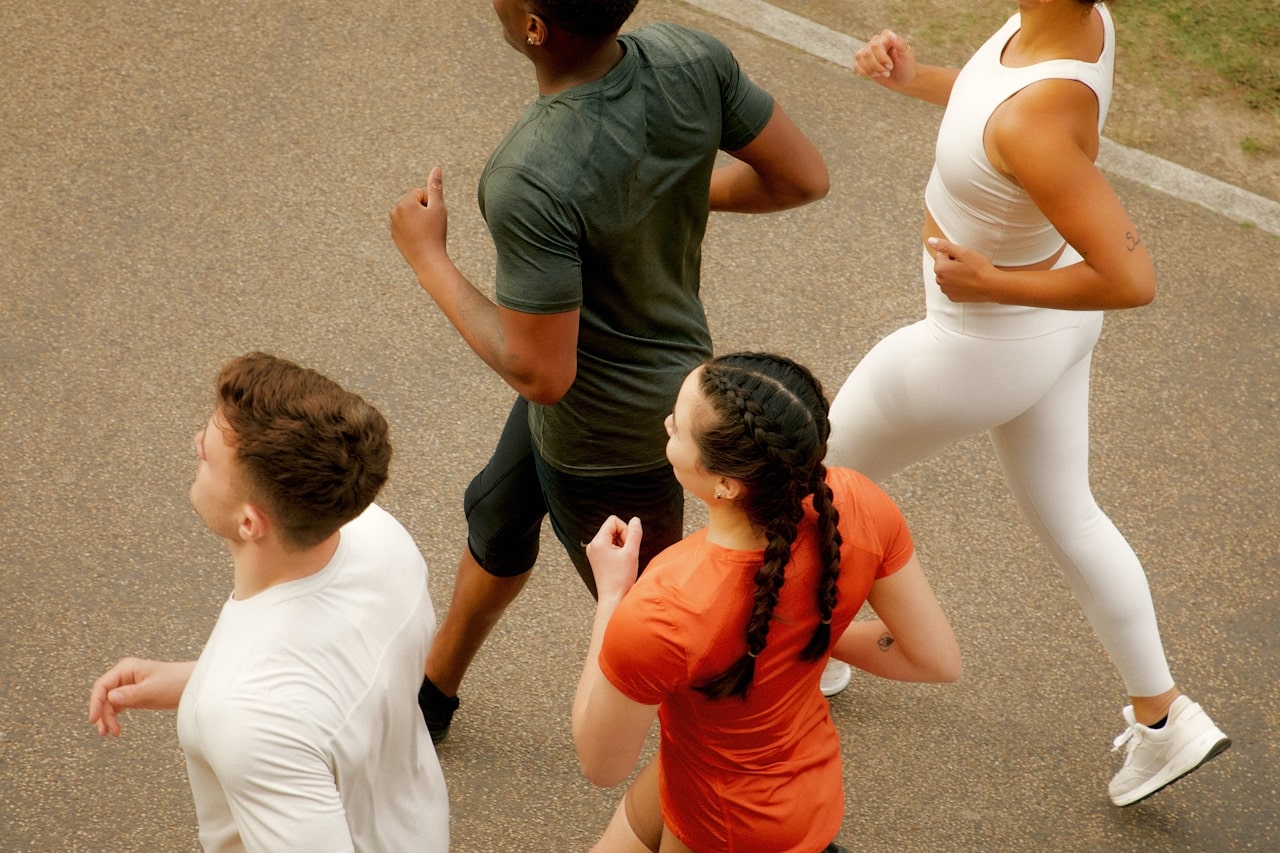 group of young friends exercising to lose weight