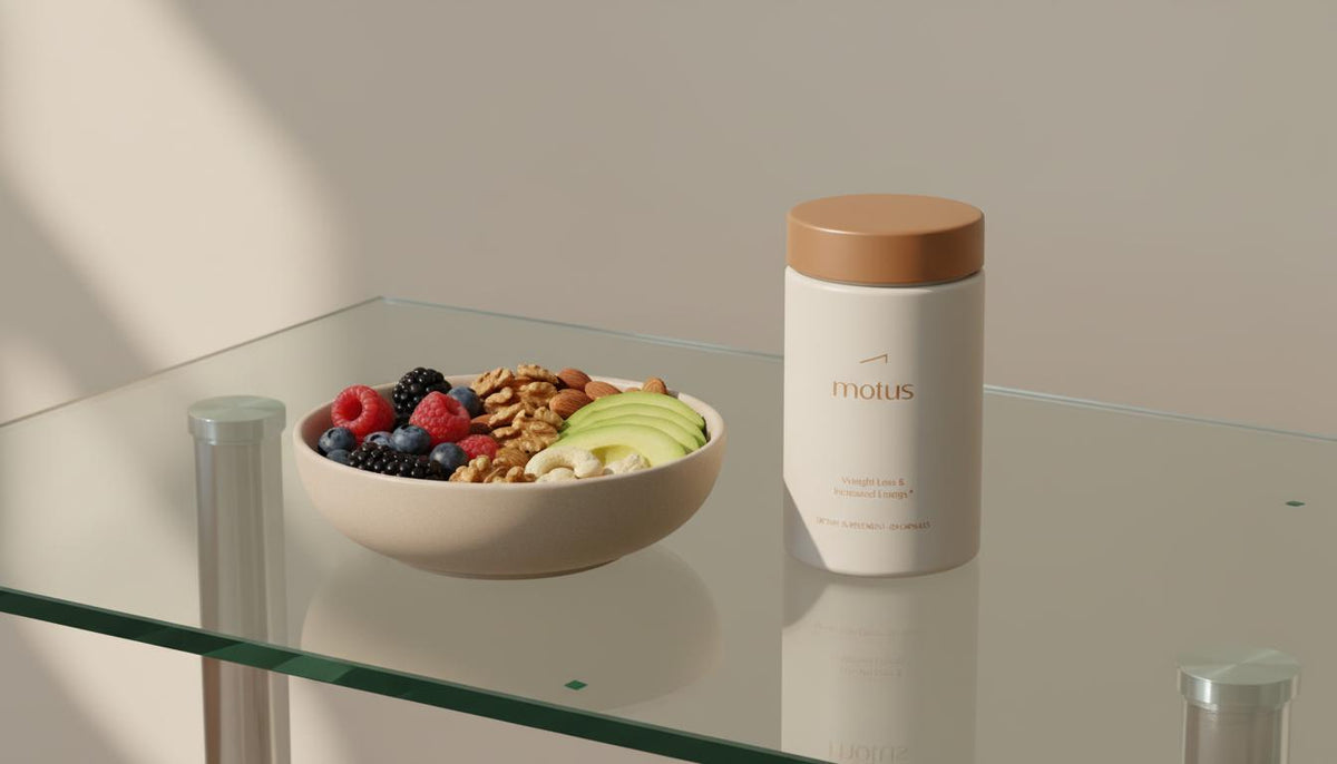 Minimalist glass table with a bowl of berries, nuts and sliced avocado beside a Tonum Motus bottle, clean composition referencing berberine belly fat support.