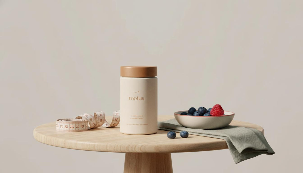 Minimalist scene with Tonum Motus supplement jar on a wooden table, measuring tape and bowl of berries, clinical lighting conveying research-backed support for berberine for belly fat.