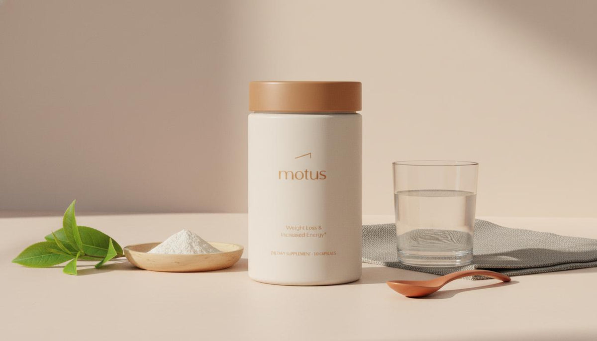 Minimalist Tonum product shot of the 'Nouro' jar beside green tea leaves, a wooden dish of powder and a glass of water on a pale beige background — closest natural thing to Adderall