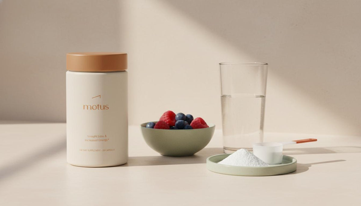 Minimal kitchen counter still-life with Tonum Motus jar beside a bowl of berries, glass of water and a scoop of unflavored whey powder — best whey protein for muscle gain visual.