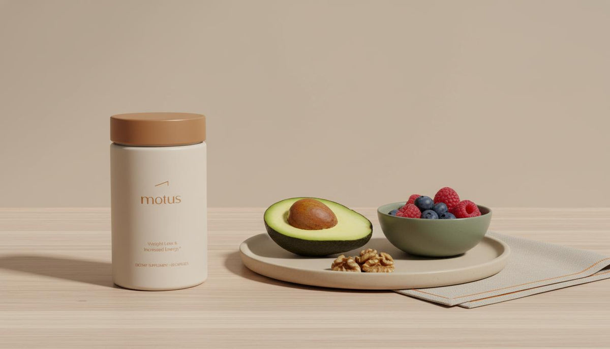 Minimalist still life of Tonum 'Motus' supplement jar with avocado half, walnuts and mixed berries on a light wooden surface against beige #F2E5D5 background, fatty liver prognosis