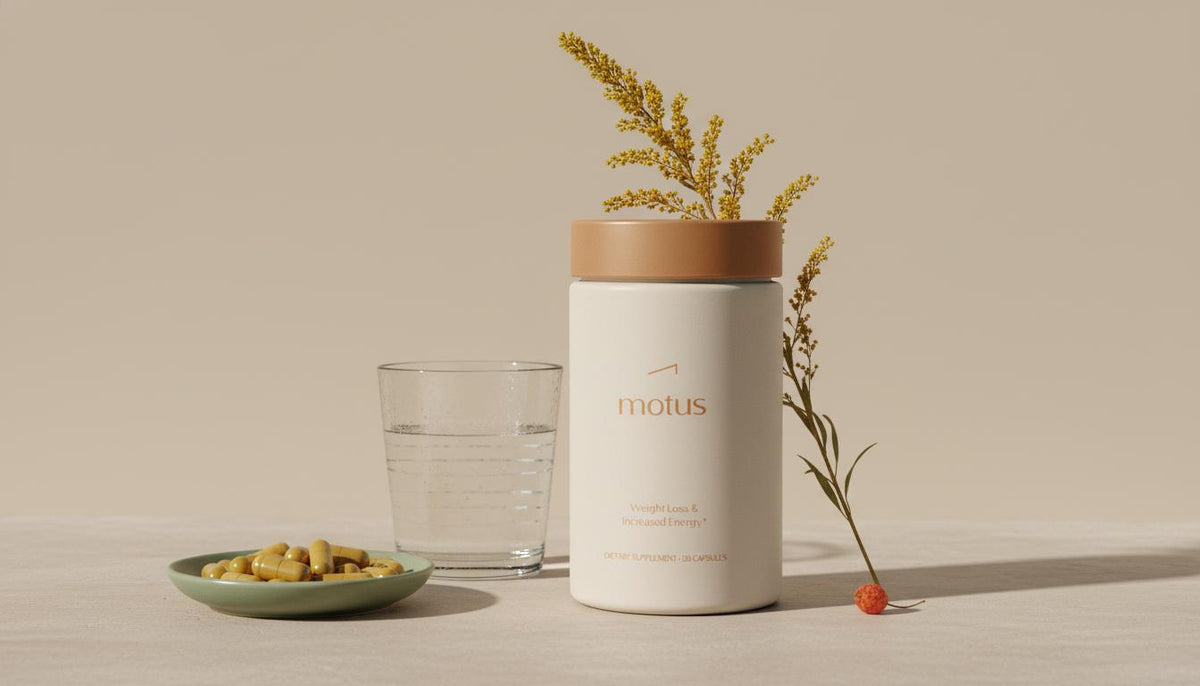 Tonum Motus container and dish of berberine capsules on a beige stone surface with a glass of water and dried berberis branch — how quickly do you lose weight with berberine