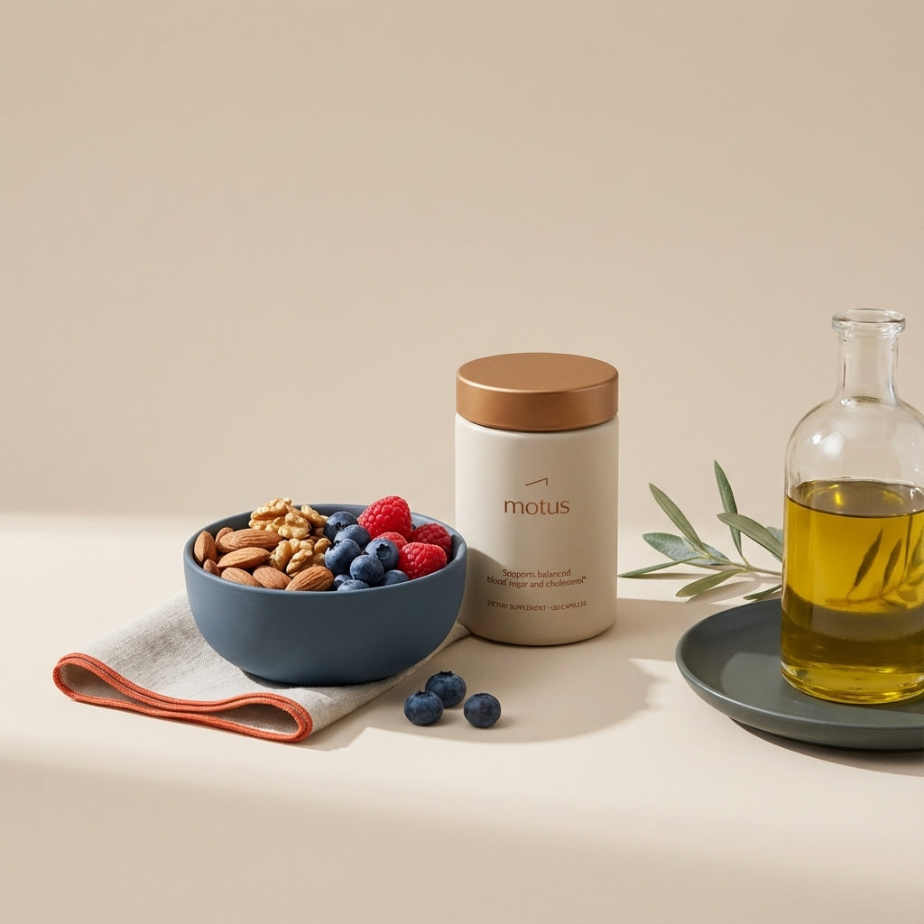 Minimal still-life of nuts, berries, olive oil and a Tonum supplement jar on a beige background, evoking nutrition to help lower blood sugar and cholesterol.