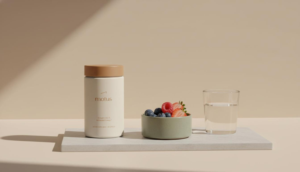 Motus supplement container on stone surface with bowl of berries and glass of water against warm beige Tonum background, minimalist scene emphasizing medical grade weight loss pills.