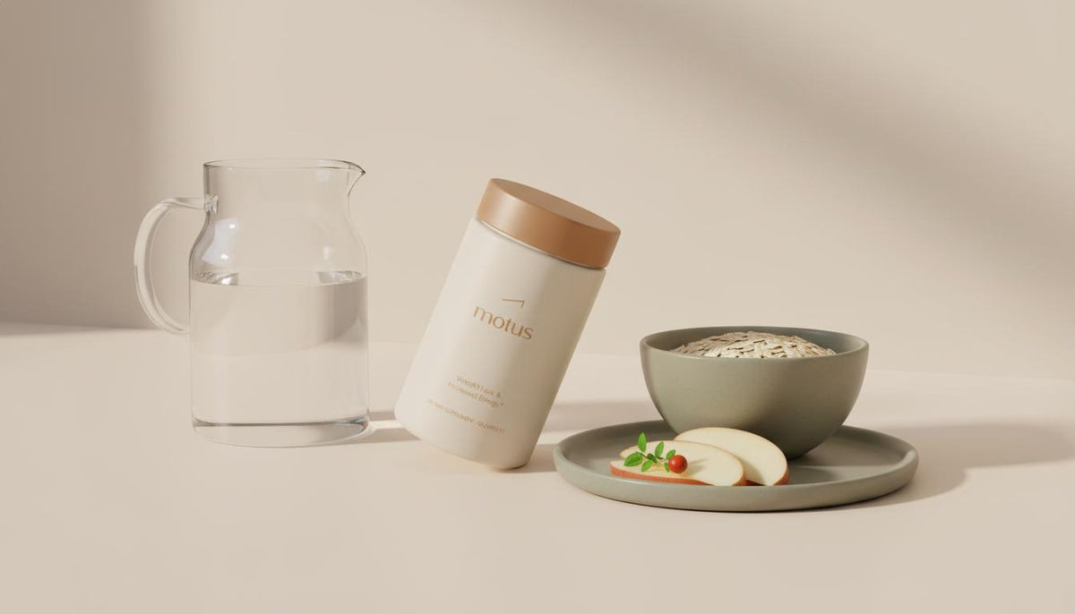Minimalist countertop scene with Tonum Motus container beside a pitcher, oats bowl and apple slices in soft natural light — proven appetite suppressant