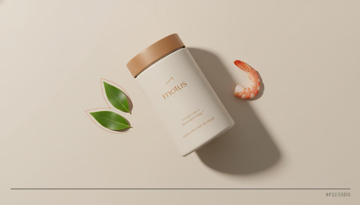 Flat-lay Tonum Motus supplement with seafood and botanical leaves on cool beige background, highlighting taurine weight loss