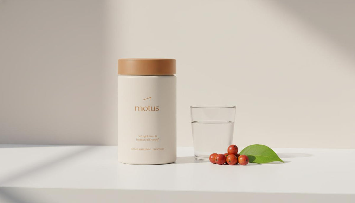 Tonum Motus supplement on a minimalist countertop with glass of water and berries in a clean clinical lifestyle photo illustrating vitamins to curb appetite