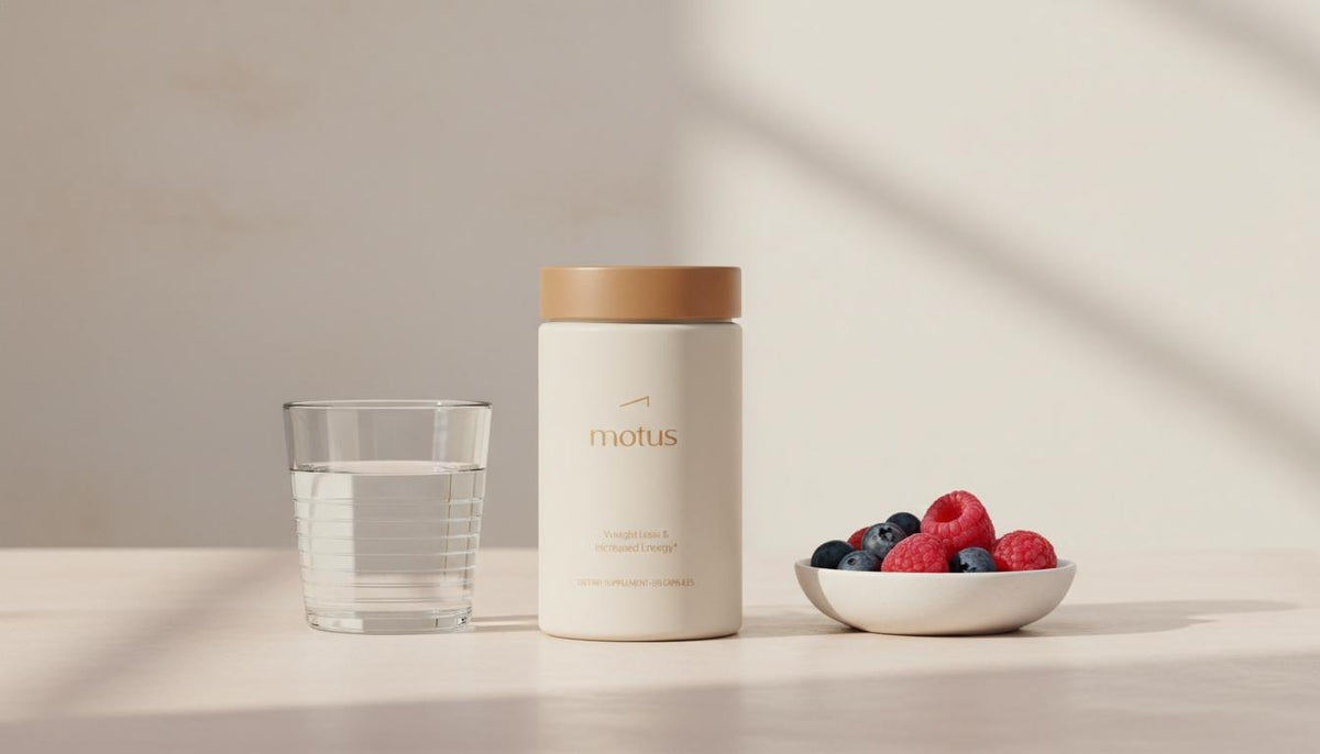 Minimalist countertop with Tonum Motus supplement container beside a glass of water and a bowl of mixed berries, soft Tonum brand colors in background — what burns belly fat fast