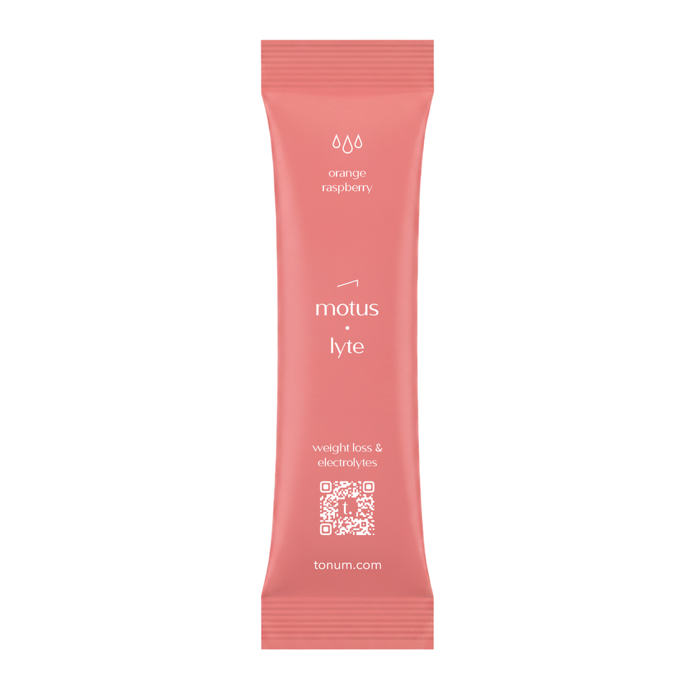 Tonum MOTUS LYTE Orange Raspberry electrolyte drink mix.