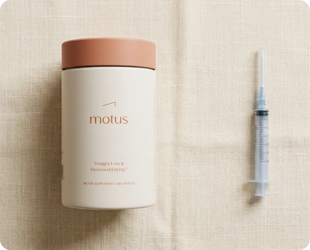 Motus bottle next to a syringe