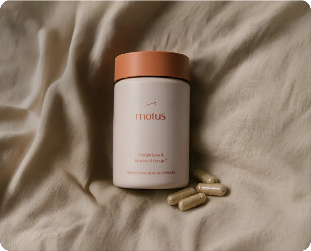 Motus bottle with capsules on linen