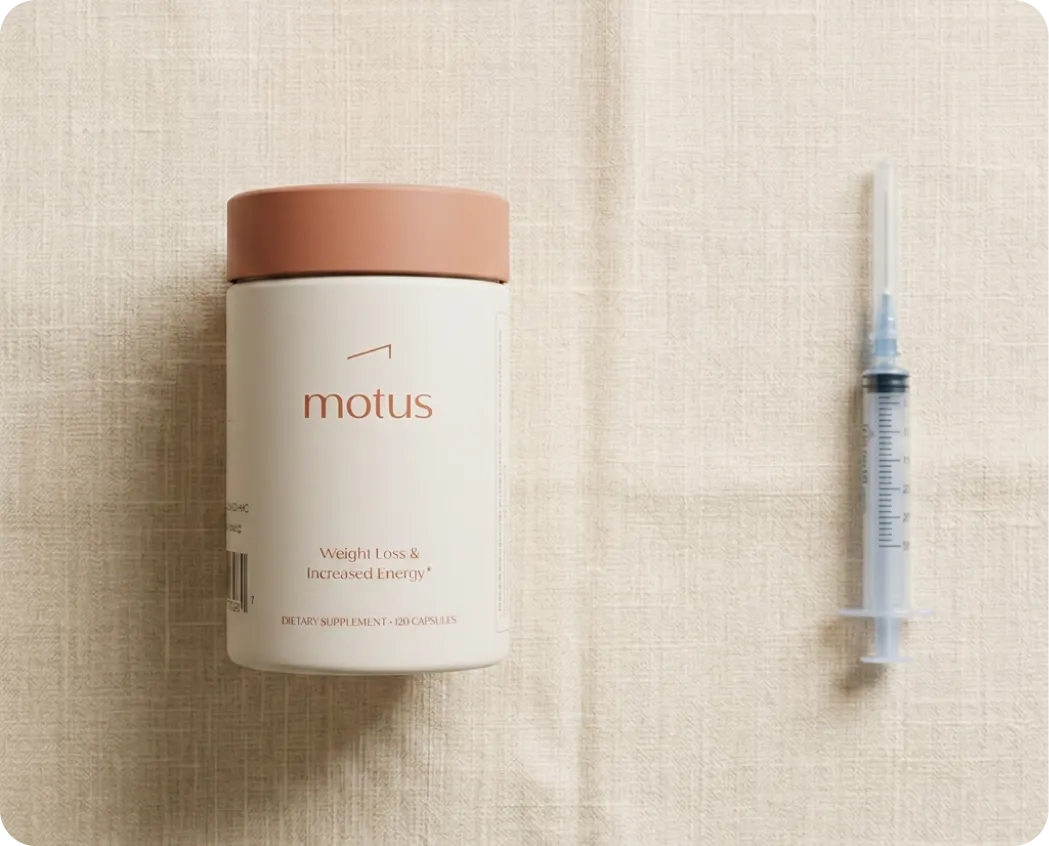 Motus bottle next to a syringe
