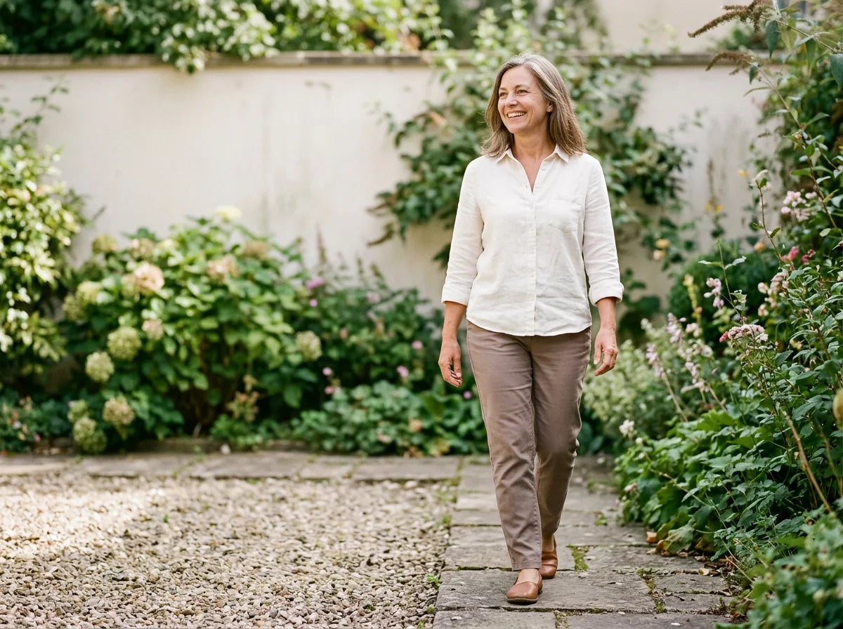 Woman walking on a garden path